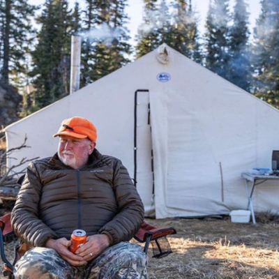 Man in front of his tent